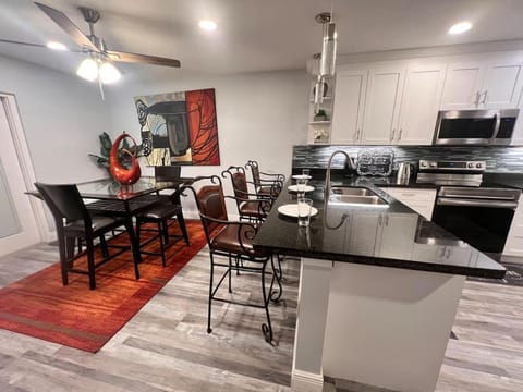 Kitchen or kitchenette, Living room, Dining area, dishwasher, oven, stove, toaster