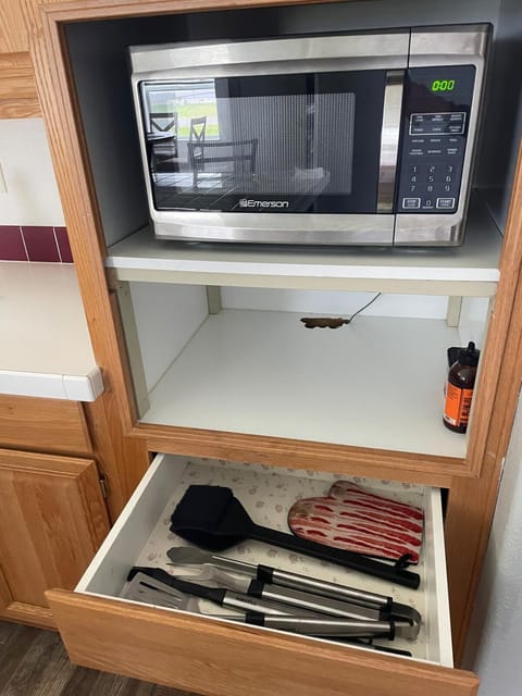 Kitchen or kitchenette, microwave