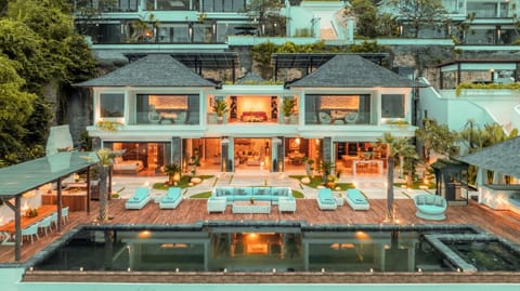 Property building, Patio, Night, Garden, Swimming pool, sunbed