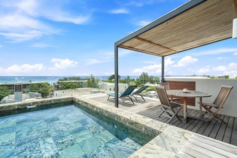 Property building, View (from property/room), Beach, Sea view, Swimming pool
