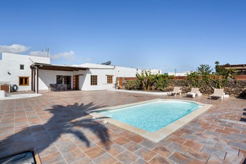 Property building, Living room, Swimming pool
