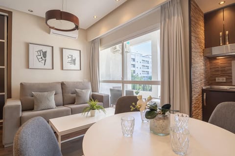 Living room, Seating area, Dining area, City view, air conditioner