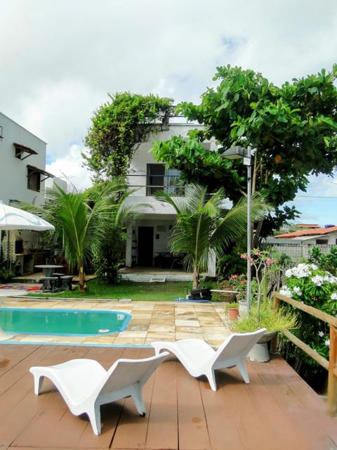 Property building, Patio, Day, Garden, Garden view, Pool view, Swimming pool, sunbed