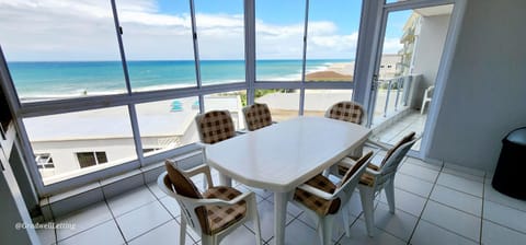 Patio, Day, View (from property/room), Living room, Seating area, Dining area, Sea view