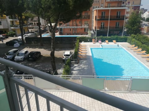 Property building, Living room, Swimming pool