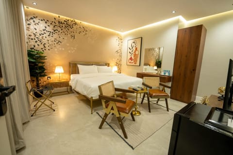 Bed, TV and multimedia, Kitchen or kitchenette, Living room, Photo of the whole room, Seating area, Dining area, Bedroom