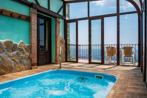 Property building, Living room, Swimming pool