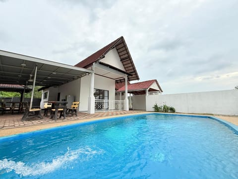 Property building, Day, Seating area, Pool view, Swimming pool