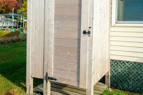 The Big Yellow Camp House in Malletts Bay