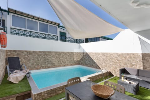 Property building, Living room, Swimming pool