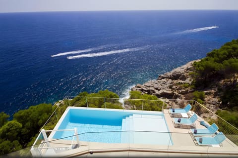 Property building, Living room, Swimming pool