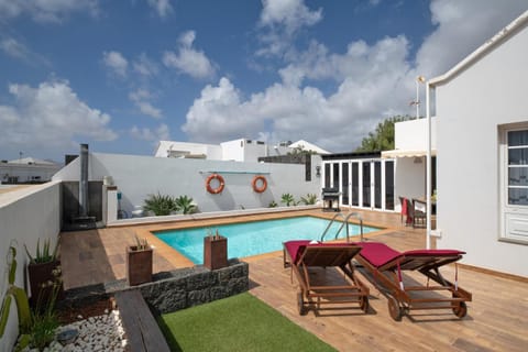 Property building, Living room, Swimming pool