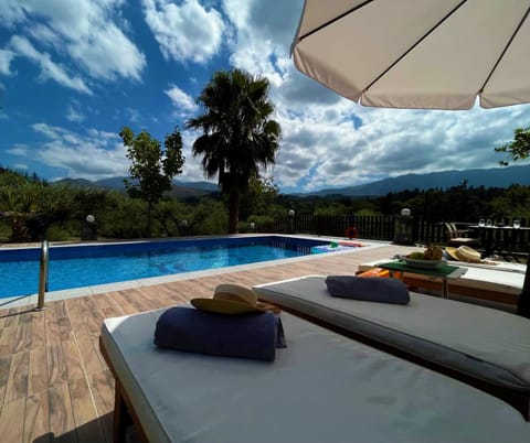 Patio, Day, Natural landscape, Mountain view, Pool view, Swimming pool, sunbed