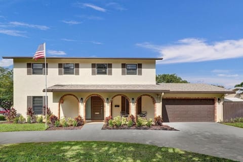 Tropical Modern Villa with Pool House in Coconut Creek