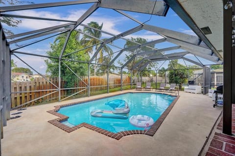 Tropical Modern Villa with Pool House in Coconut Creek