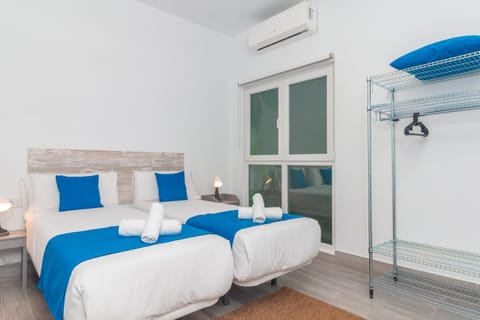 Bed, Photo of the whole room, Bedroom, towels, air conditioner