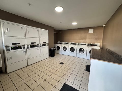 Property building, washing machine, dryer