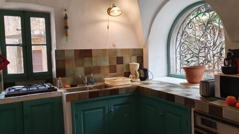 Kitchen or kitchenette, stove