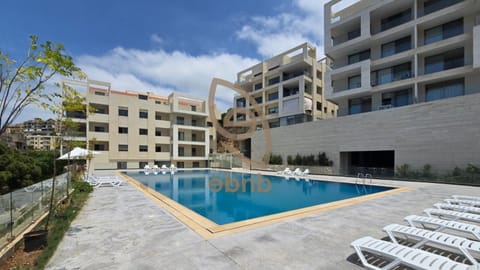 Property building, Patio, Pool view, Swimming pool, sunbed