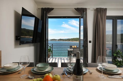 TV and multimedia, View (from property/room), Living room, Dining area, Sea view