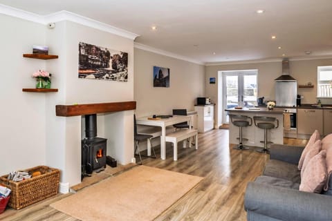 Living room, Dining area, fireplace, kitchen