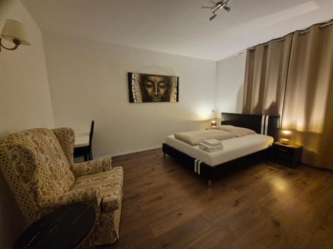 Shower, Toilet, Bed, Living room, Photo of the whole room, Seating area, Bedroom, dishwasher, furniture, furniture, furniture, hair dryier, heating, heating, internet, internet, internet, microwave, oven, soundproof, stove, toaster, towels, towels, kitchen