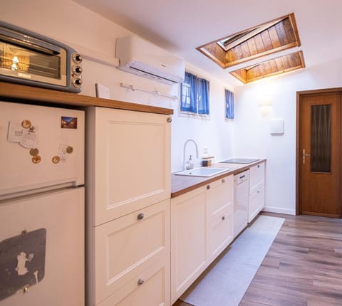 Kitchen or kitchenette, stove, kitchen