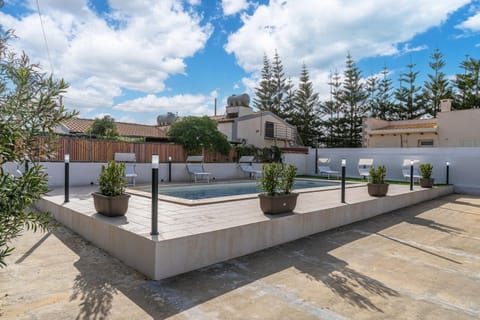 Property building, Living room, Swimming pool
