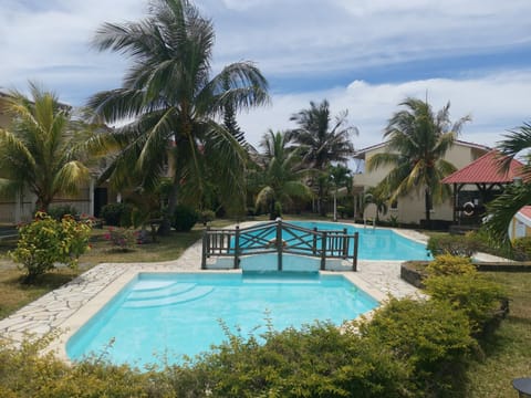 Property building, Day, Natural landscape, Garden, Garden view, Pool view, Swimming pool, Swimming pool