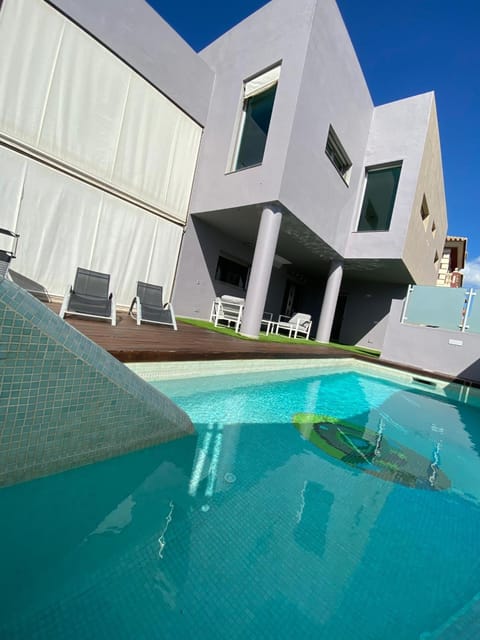 Property building, Living room, Swimming pool