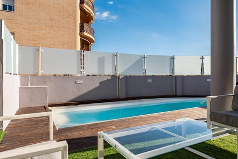 Property building, Living room, Swimming pool