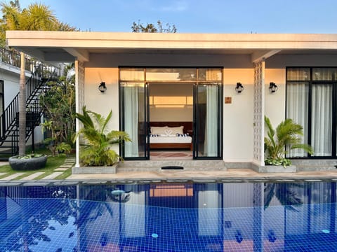 Property building, Patio, Day, Pool view, Swimming pool