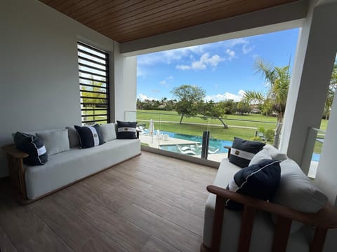 Patio, Bed, Day, Natural landscape, Garden, View (from property/room), Balcony/Terrace, Living room, Photo of the whole room, Seating area, Bedroom, Garden view, Pool view, Swimming pool, sunbed