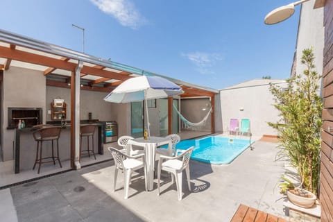 Property building, Patio, Day, View (from property/room), Balcony/Terrace, Dining area, Pool view, Swimming pool, sunbed