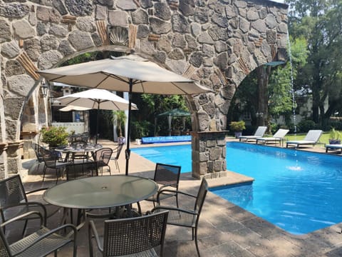 Patio, Day, Pool view, Swimming pool, sunbed