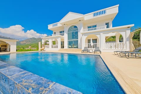 Property building, Patio, Pool view, Swimming pool, sunbed