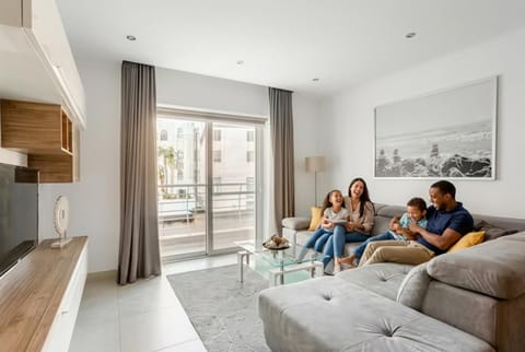 People, TV and multimedia, Living room, Seating area, group of guests