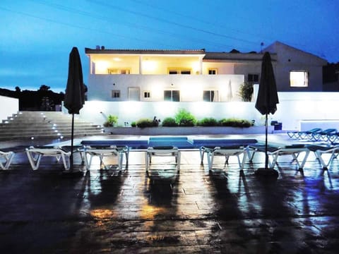 Property building, Night, Swimming pool
