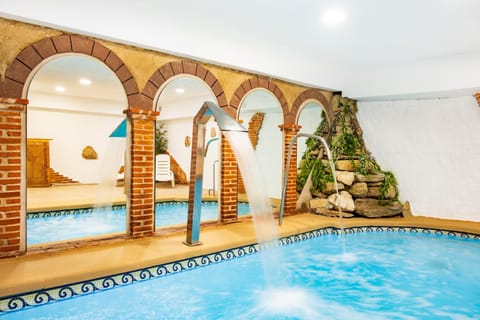 Property building, Living room, Swimming pool