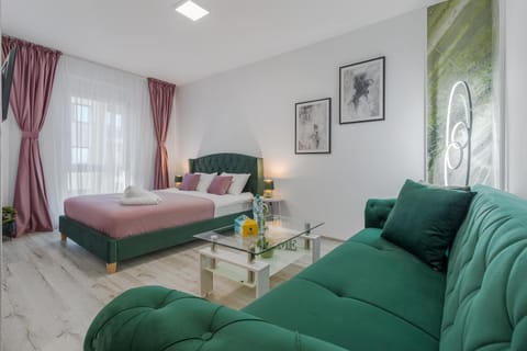Bed, Living room, Seating area, Bedroom