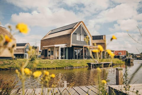 Property building, Day, Natural landscape, Lake view