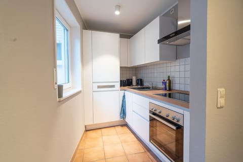 Kitchen or kitchenette, oven, stove