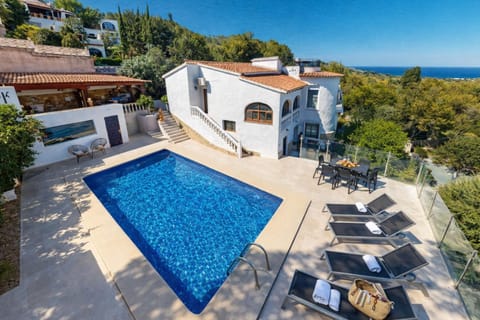 Property building, Patio, Day, Natural landscape, Pool view, Sea view, Swimming pool, sunbed