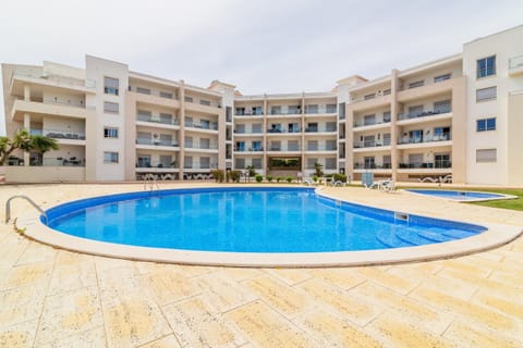 Property building, Living room, Swimming pool