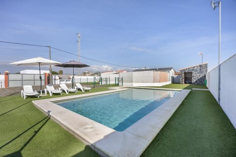 Property building, Living room, Swimming pool