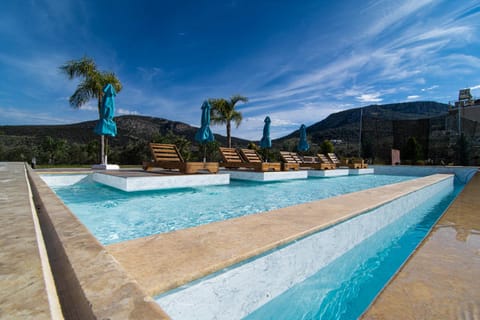 Day, Natural landscape, Mountain view, Pool view, Swimming pool, sunbed