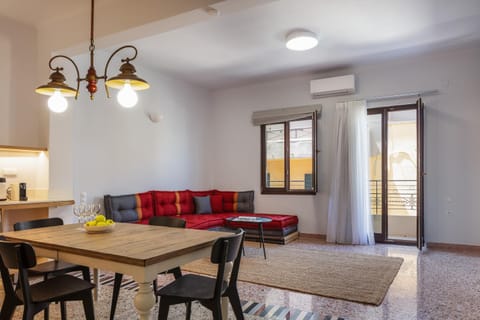 Property building, Living room, Seating area, Dining area, air conditioner