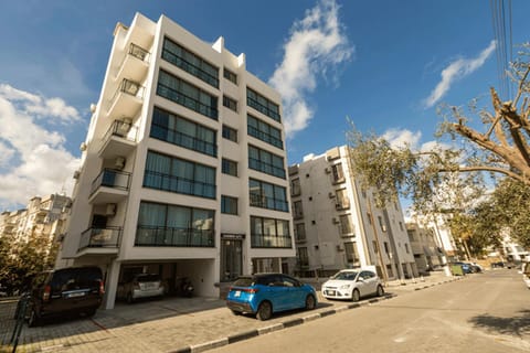 Property building, Day, Neighbourhood, City view, Street view, Location, Parking