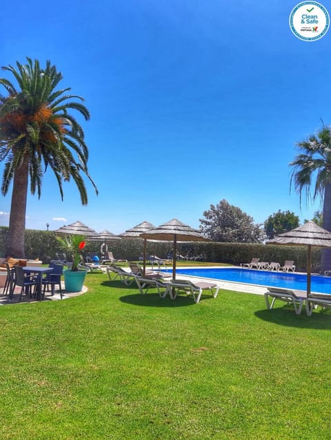 Property building, Patio, Garden, Swimming pool