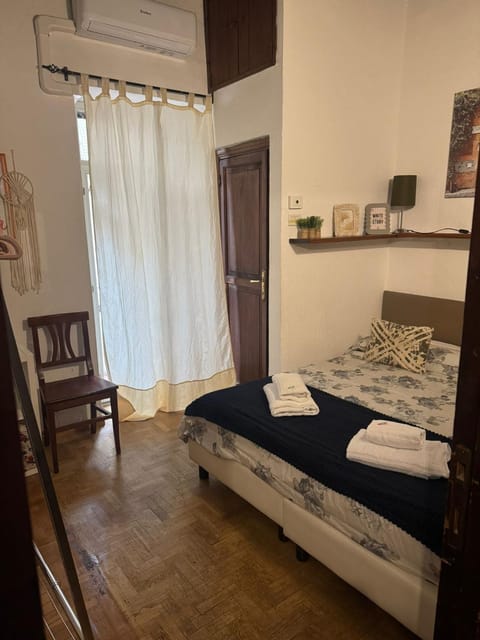 Bed, Bedroom, towels, air conditioner